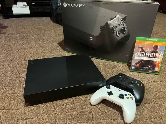 Продам 
Xbox one x 1tb