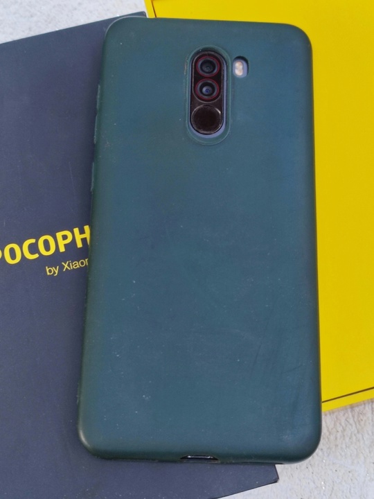 Xiaomi Pocophone F1.
Midnight grey.  (2)