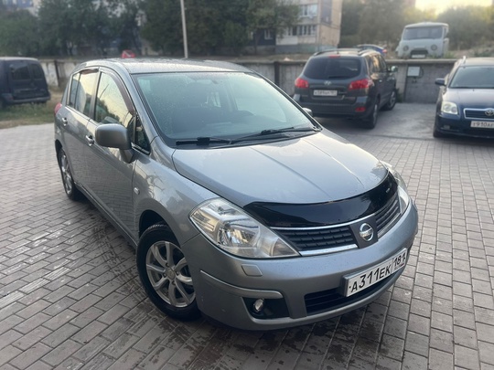 Nissan Tiida 
2008 года
1,6 бензин (1)