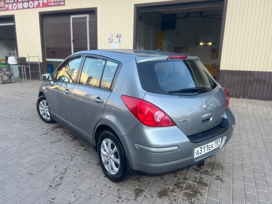Nissan Tiida 
2008 года
1,6 бензин (2)