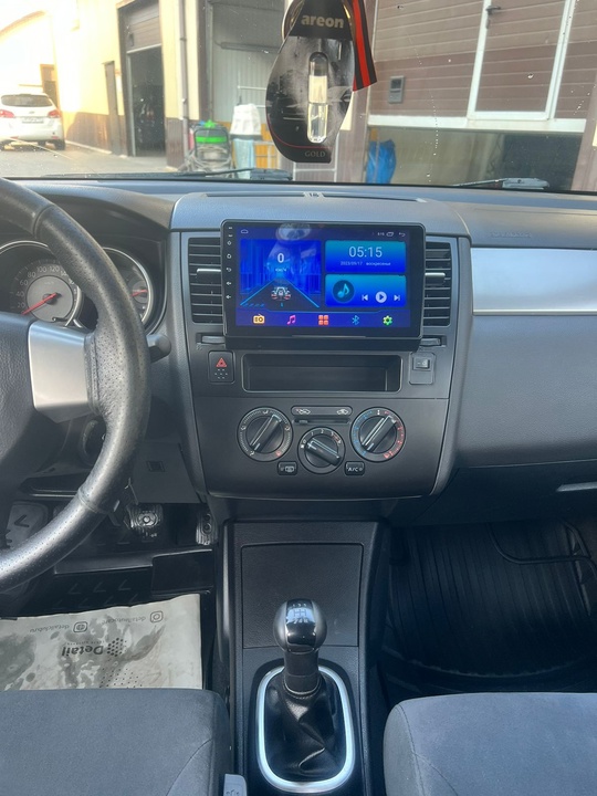 Nissan Tiida 
2008 года
1,6 бензин (4)