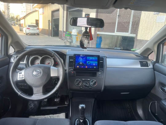 Nissan Tiida 
2008 года
1,6 бензин (5)