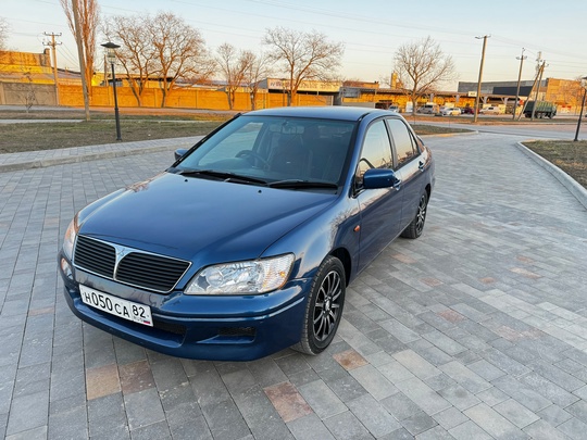 340 тыс Митсубиси лансер, 2001г