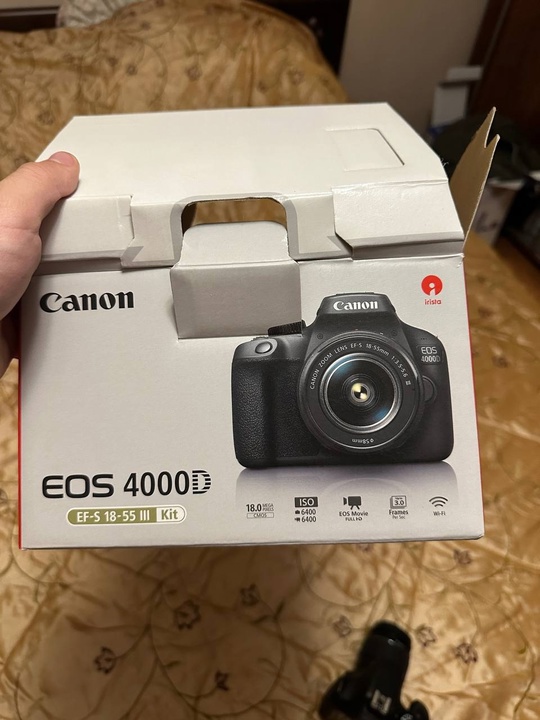 Продаю Cannon 4000d Комплект(зарядка ,ремешок