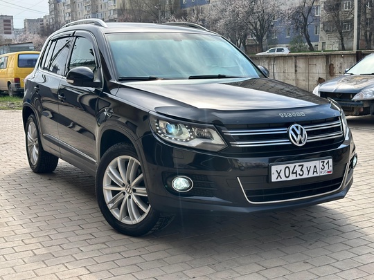Volkswagen Tiguan 
2013 год ( (1)