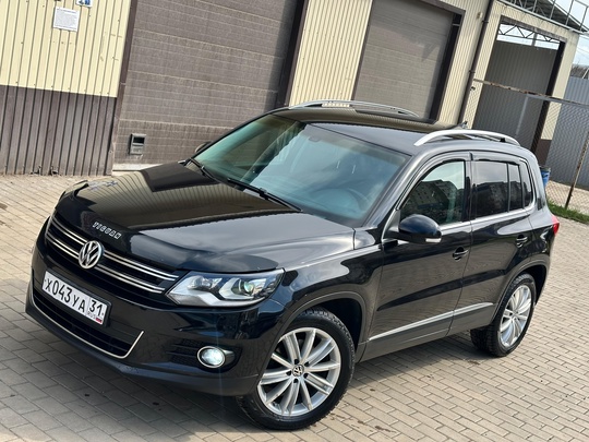 Volkswagen Tiguan 
2013 год ( (2)