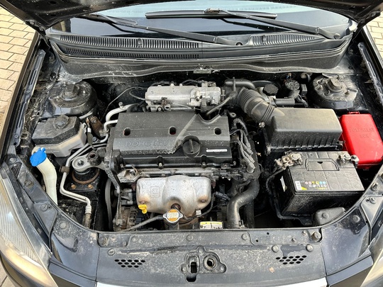Kia Rio 
2010 год 
1.4 (6)
